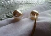 Porta-guardanapo dourado com pedra  de strass